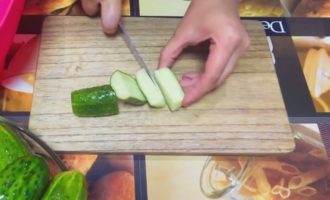 How to prepare cucumber salad without sterilization for the winter? Cut off the ends of washed, thorn-free cucumbers. Cut them into oblong bars. It can be divided in half and then into strips approximately 1.5 cm wide. If the skin is rough or damaged, you can cut it off completely or partially.