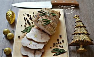 Serve the prepared turkey meat as a cold appetizer, seasoned with a sprig of rosemary.