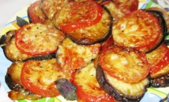 Place the finished eggplants with tomatoes and cheese on a dish and serve either hot or cold.