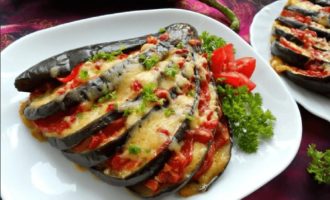 Eggplants with cheese and tomatoes, baked in the oven