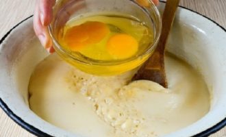 After the yeast has started working, add an egg to it, which must first be beaten a little with a whisk.