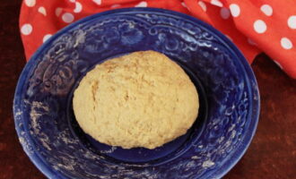 Then add the remaining flour with baking powder and knead into a homogeneous dough.