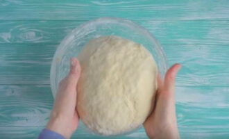 Mix the dough thoroughly and then knead it with your hands.