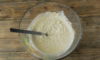 Sift the flour, then pour it in small portions into the bowl, stirring the dough each time.