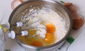 Beat the mixture at low speed until a fluffy, homogeneous mass is formed.