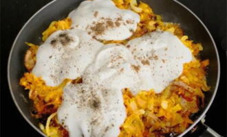 Next, remove the lid and add sour cream, nutmeg, salt and ground pepper to taste. If you want a thinner gravy, add a couple tablespoons of water. 