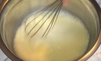 In a separate bowl, whisk the egg, remaining sugar, milk and melted butter.