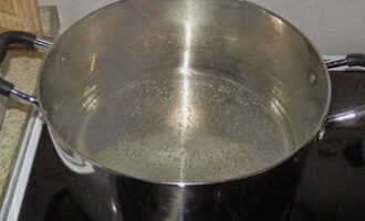 Place a pan of water on the stove. Add salt and sugar to boiling water.