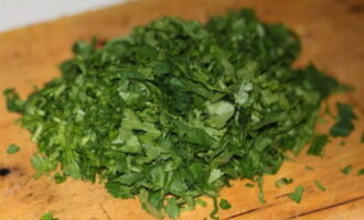 Wash fresh greens well. We remove excess moisture from it using paper towels. Chop the greens. For this recipe you can use cilantro, dill, parsley and even mint. 