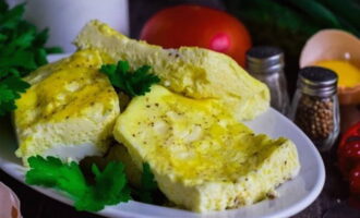 Cut the finished omelette into pieces and serve hot, sprinkled with chopped herbs or garnished with fresh vegetables.Therefore, the same recipe can be used to prepare an omelette with various additional ingredients: ham, tomatoes or cheese.