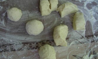 You can start making pies. Divide the dough into parts and add any filling.