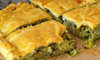 Bake in an oven heated to 180 degrees for about 40 minutes until golden brown.Cut the finished cabbage pie into portions and serve, sprinkled with chopped dill on top. 