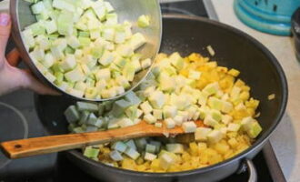 Cook the potatoes for about 10 minutes and add zucchini.