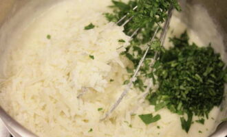 Add grated hard cheese and finely chopped parsley to the sauce, mix and remove from heat.