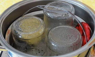 Sterilize the jars by steaming or in the oven, rinse the lids with boiling water or place in boiling water for several minutes. 