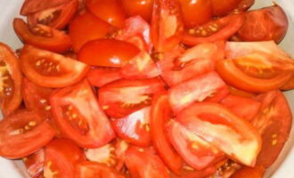 Simply divide the tomatoes into quarters.