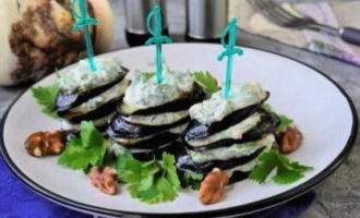 Georgian style eggplants with nuts are ready. Place them on a plate and serve.