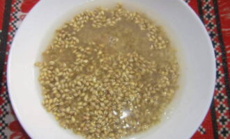 Pour warm water over the cereal and rinse it thoroughly. No need to soak.