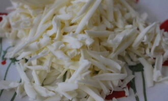 For the filling, grate suluguni cheese on a coarse grater.