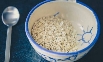 Salt the water and carefully add oatmeal, stir immediately.