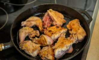 Pour vegetable oil into a heated frying pan and add rabbit meat. Fry the meat on both sides until golden brown. Then add butter to the pan and cook over low heat for 1-2 minutes.