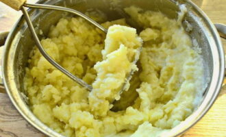 Mash the potatoes with a masher. To make the consistency more uniform, use a blender.