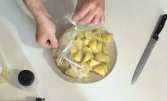 Then carefully cut the bag and remove the cooked potatoes.