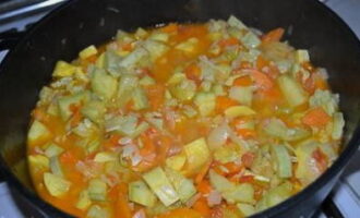 Add the zucchini and simmer the contents over low heat for about 15 minutes.