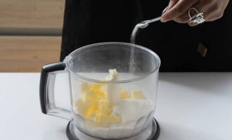 Sift the flour directly into the bowl. Add ¼ teaspoon of salt. Grind the butter to fine crumbs. 