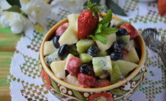 Juicy and light fruit salad with yogurt is ready. Try it!