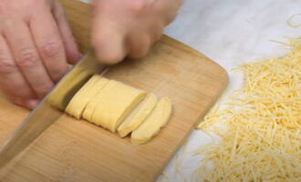 You can cut into wider pieces, as in the photo - you get wide noodles.