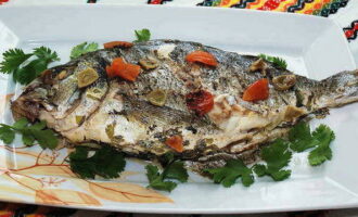 Decorate the finished fish with herbs and serve. Dorado is also served with any side dish.