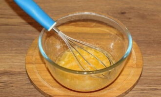 Beat the eggs with a whisk in a separate bowl.