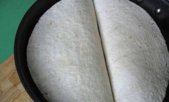 Fry each filled tortilla on both sides until browned and the cheese inside has time to melt. 