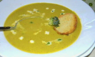 Serve vegetable puree soup with fresh herbs and croutons.