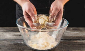 For the dough, mix softened butter with flour until crumbly.