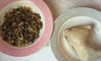 Boil the chicken leg in salted water until tender.