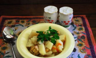 Simmer for about 20 more minutes (until the potato cubes are soft) and place on plates. Bon appetit!