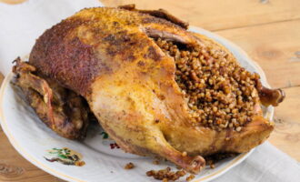 Duck with buckwheat in the oven