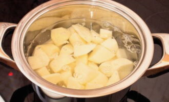 Place the potatoes in a saucepan, add water and boil until tender.