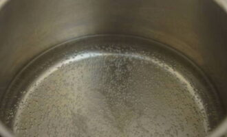 Pour water into a saucepan, add salt to your taste and bring to a boil over high heat.