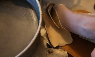 Using a sharp knife, carefully remove the thick outer shell of the tongue and cut off excess fatty pieces.