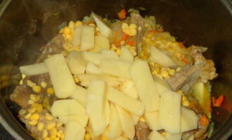 Cut the peeled potatoes into small cubes and add to the rest of the ingredients.