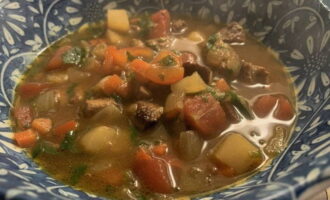 Place the cooked noodles in deep serving bowls and pour the stewed beef with vegetables along with the sauce over it. Lagman in Uzbek style is ready at home! Sprinkle the dish with chopped herbs and you can serve for lunch. Bon appetit!   