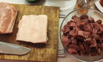 If you have lard with a layer of meat, then carefully cut it off, because stewing requires fat.