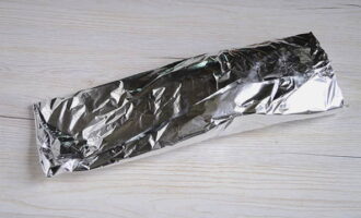 Place the dough on foil and wrap it tightly to prevent any juice from leaking.