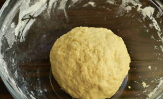 With clean and dry hands, knead the dough.