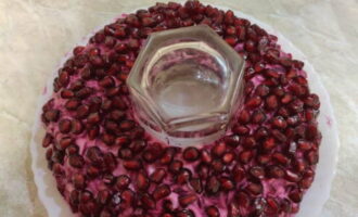 We finish our salad with bright pomegranate seeds.