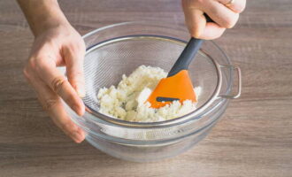 First, grind the cottage cheese through a fine sieve.