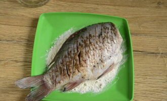 Dredge both sides generously in wheat flour.